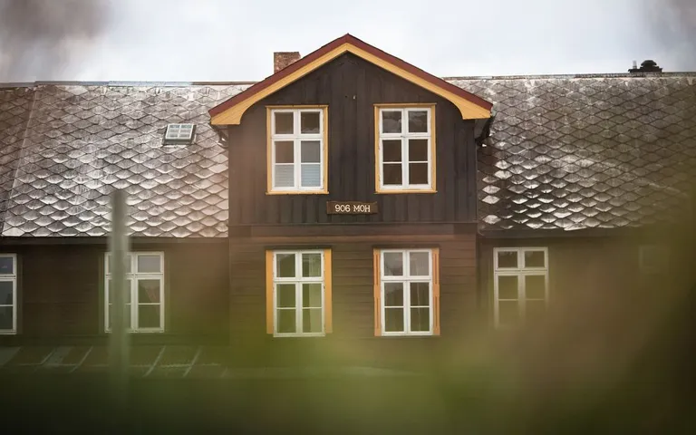 The traditional main house at Nøsen with its dark timber facade